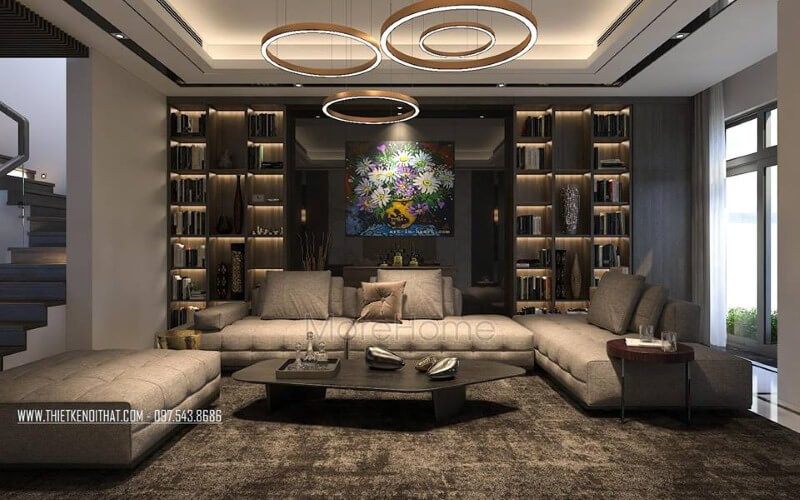 Bố trí nội thất phòng khách hiện đại, đẹp với bộ bàn ghế sofa lớn, kệ ốp tường, tranh treo tường.