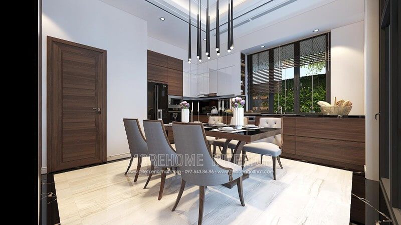 Sử dụng gam màu nâu trầm đóng vai trò chủ đạo, tủ bếp gỗ Veneer được coi là điểm nhấn sang trọng cho cả không gian